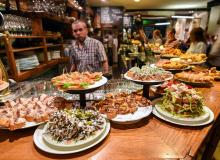 At Basque-style tapas bars, pintxos are already laid out, so you can simply point to or grab what you want. Photo by Cameron Hewitt