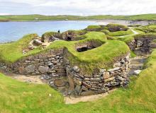 Ancient ruins on Scotland’s Orkney Islands include these 5,000-year-old homes at Skara Brae. Photo by Cameron Hewitt