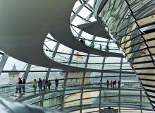 At the Reichstag in Berlin, visitors are treated to endless vistas as they spiral up the 80-foot-high glass dome. Photo by Dominic Arizona Bonuccelli
