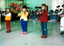 On our day tour in mainland China, children in an elementary school performed for us. Photos by Stephen Addison