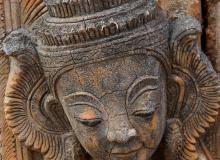 Carving of a guardian spirit on the wall of an ancient stupa in Inn Thein (Indein) village at Inle Lake in Myanmar. Photo: ©Steve Estvanik/123rf.com