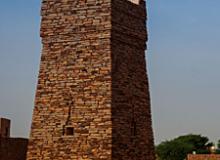 In the Western Sahara, the oasis city of Chinguetti, Mauritania, features the massive minaret of the 13th-century Chinguetti Mosque. Photo: © Sergey Mayorov/123rf