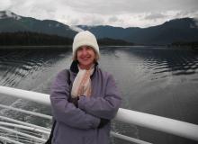 Carole on the fantail of a ferry in the Wrangell Narrows — southeastern Alaska. Photo by Marv Feldman