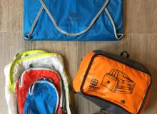 Clockwise from top: Garment folder, Cargo Hauler duffel, self-stowing Matador backpack and stacked packing cubes. Photos by Mark Gallo