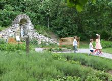 Children passing by the shrine that remains of the monastery — Borromeo Garden, Brno, Czechia. Photos by Yvonne Michie Horn