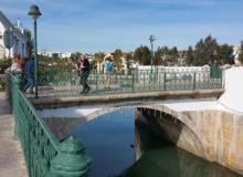 A colorful pedestrian bridge connects Tavira’s two historic districts — the Algarve, Portugal. Photo by Gail Minoff-Keck