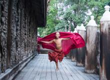 A novice monk modeling for us at Shwenandaw Monastery. Photo by Julie Cassen