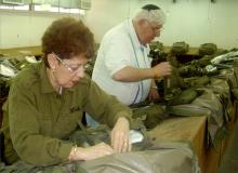 At a medical facility in central Israel, volunteers packed medical supplies in backpacks for the IDF. Photo: Plotkin