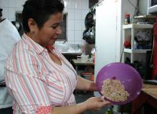 Maria Luisa Guzman with the fish balls mixture. Photos by Sandra Scott