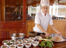 Chef Ning preparing for the cooking demonstration aboard the ship. Photos by Sandra Scott