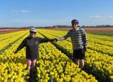 Harvey and Linda Segal in a tulip field near Noordwijk, Holland.
