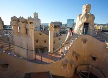 The rooftop of La Pedrera displays an arrangement of chimneys and ventilation towers for the apartments below. Photo by Margaret Mallory