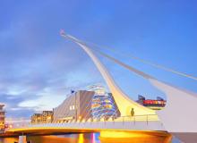 The Samuel Beckett Bridge over the River Liffey joins Guild Street on the north bank to Sir John Rogerson’s Quay on the south — Dublin, Ireland. Photo ©Laurentiu Iordache/123rf.com