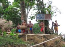 A small band of Emberá men singing and playing instruments made by hand