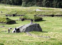 The Iron Age Farm at Ullandhaug, Norway, consists of two longhouses, smaller buildings, wells, stone fences and burial mounds from AD 350 to 550.