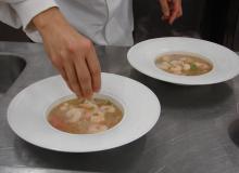 Garnishing the Shrimp & Rice Vermicelli Soup. 