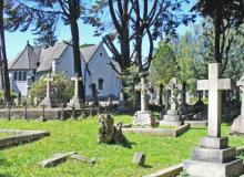 The very Anglican-looking Holy Trinity Church and its graveyard, located in Nuwa