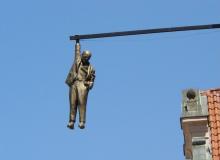 David Cerny’s sculpture “Man Hanging Out”