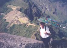 David Irving positioned on Huayna Picchu, overlooking Machu Picchu, in Peru — not so precarious a perch.