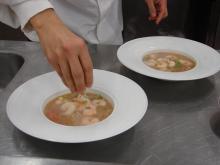Garnishing the Shrimp & Rice Vermicelli Soup. 