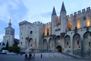 When a French pope was elected in 1309, the Catholic Church actually bought Avignon and built the imposing Palace of the Popes. Seven popes ruled from here for nearly a century. During this time, Avignon grew from a sleepy village into a thriving city. Photo by Rick Steves