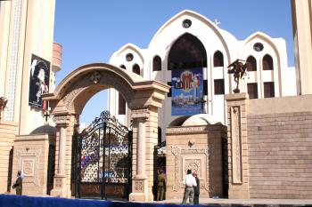 At the entrance to the Coptic Orthodox Cathedral of Archangel Michael, awaiting the arrival of His Holiness Pope Shenouda III for its consecration — Aswan, Egypt.