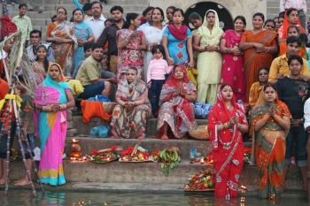Women waiting to offer Chhath prayers at the Ganges River in Varanasi, India. Photo by Wanda Bahde