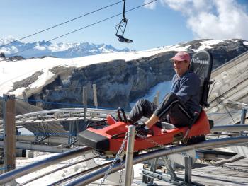 Tour organizer Steve Belkin riding the alpine coaster at Glacier 3000.