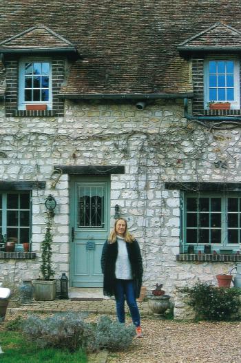 Our home-visit hostess, Carol, in front of her 200-year-old house in Vernon.