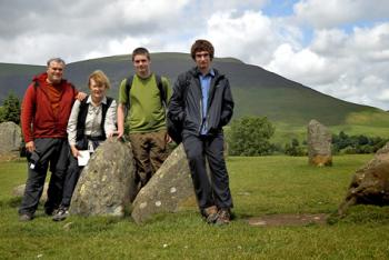 Scott and Sandy Graham and grandsons Joe and Jake at the stone circle during a hike in Keswick, England. Tripod photo by Scott Graham 
