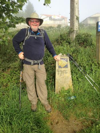 Don Horel beside a Camino marker just outside Aruza, 40 kilometers from Santiago, Spain. Photo by Australian pilgrim Garry