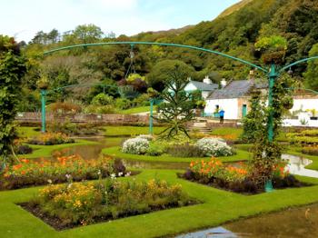 Kylemore Abbey’s pleasure garden, with the head gardener’s cottage in the background. Photos by Yvonne Michie Horn