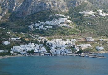 Neighboring villages look like smears on a mountain.