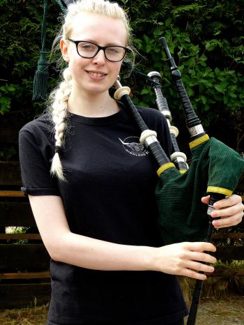 Lucy Murray, bagpiper at Aberdeenshire Highland Beef farm, an hour outside of Aberdeen, Scotland.