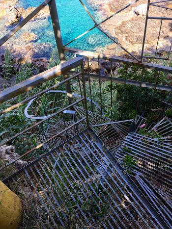 The spiral stair to the bay at the hotel Blue Lagoon in Stoupa, Mani Peninsula, Greece.