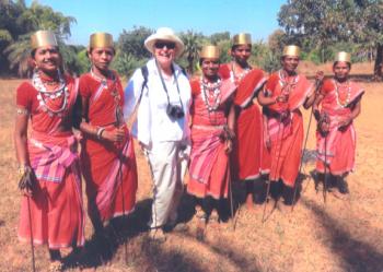 Claudia Kelly with village dancers near Jagdalpur, Chhattisgarh, central-eastern India.