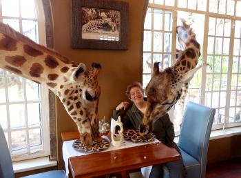 Sharing breakfast with giraffes at Giraffe Manor.