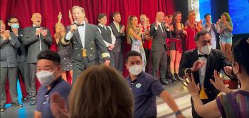 After the Crystal Serenity’s last main show, Cruise Director Rick Spath led the audience in singing “We’ll Meet Again” as all the crew, staff and officers paraded through the theater. Photo by John Leach
