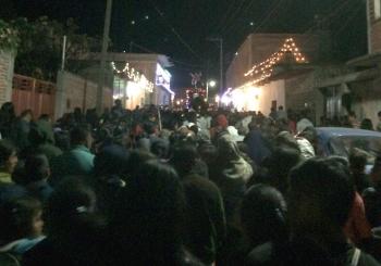 The growing crowd toward the end of our Las Posadas procession.