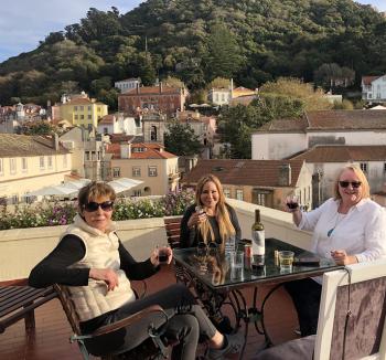 Tour members sipping wine on the terrace of a room in the Tivoli Sintra Hotel in October 2019 — Portugal. Photos by Jean Moss