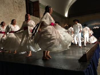Dancers performing at the Guelaguetza show at Hotel Quinta Real.