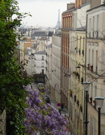 A view from the Parc de Belleville, with the iconic symbol of the city visible in the distance.