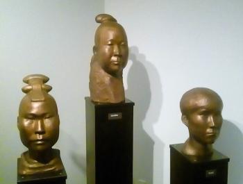 Sculptures of different native northern peoples in a museum in Nain.