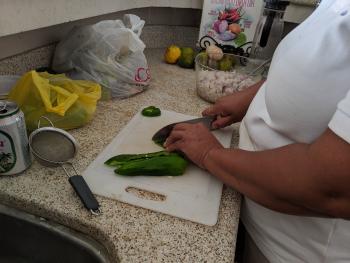 Dicing a pepper.