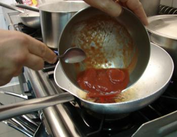 Adding tomatoes for the Spaghetti Amatriciana. Photos by Sandra Scott
