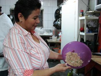 Maria Luisa Guzman with the fish balls mixture. Photos by Sandra Scott