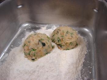 Coating the Sea Purslane Fish Cakes in flour.