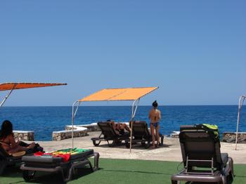 Seafront sunbathing at the SamSara Cliff Resort – Negril, Jamaica.