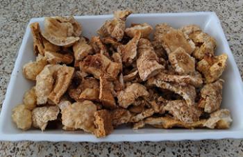 The <i>chicharrones</i> (fried pork rinds).