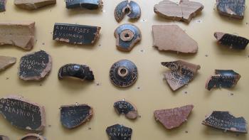 Ostraka (ballots) on display in the on-site museum in the Stoa of Attalos in the Greek agora in Athens.